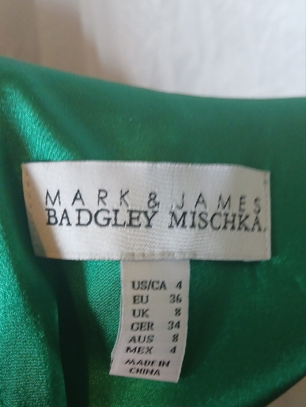 Sleeveless Emerald Pleated Mini Dress with Tie Neck - Picture 4 of 5